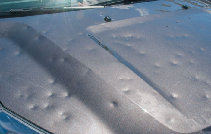 What does hail damage do to a car?